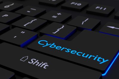 Black keyboard where the enter key is glowing blue showing the word cybersecurity information security concept 3D illustration